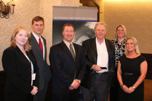 National Arbitration Forum officials present Daniel Yamshon with the Honorable Harold Kalina Civil Justice Award.  ( Left to right: Erin Hinderks, Ryan Chandlee, David Schaibley, Daniel Yamshon, Colleen Askvig and Jodi Beste.)